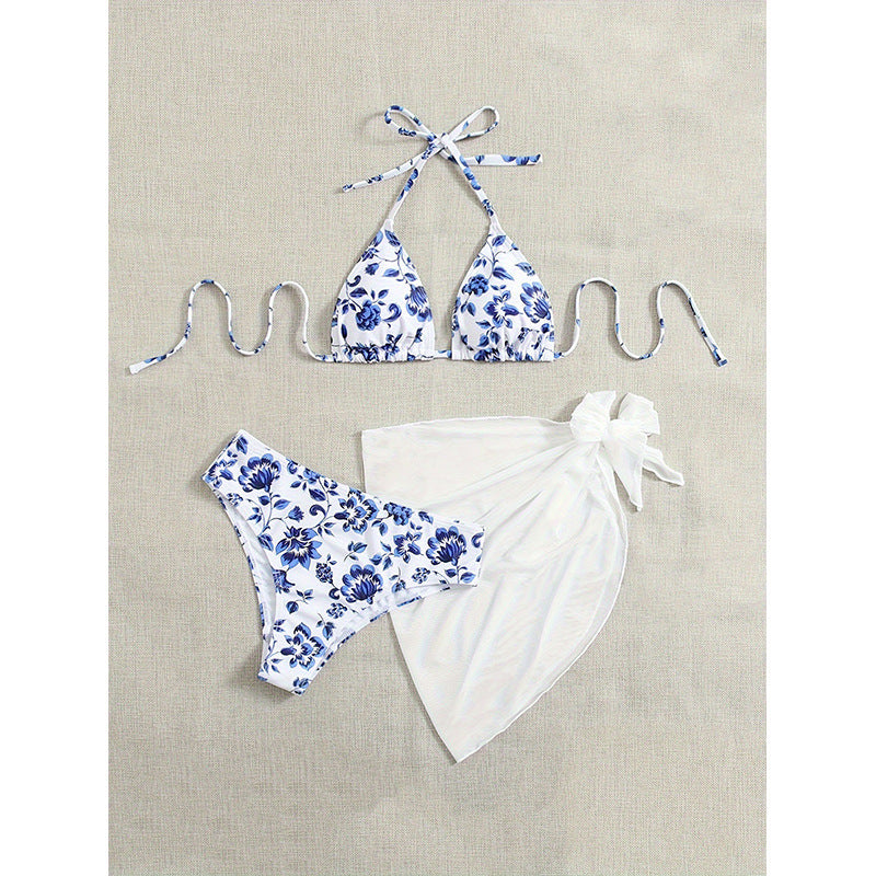 Dame trekant-bikini med blomstrete design og smart sarong Skovae