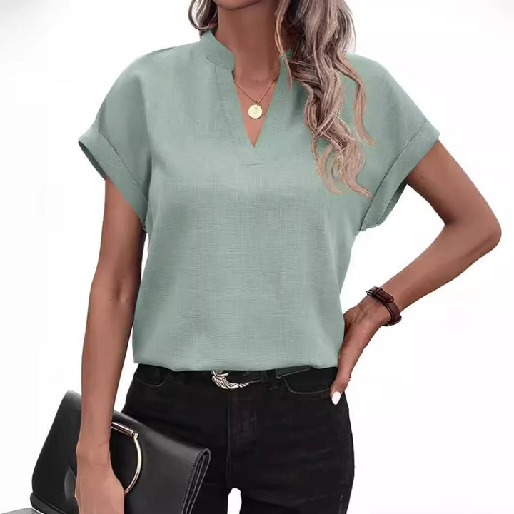 Damer løs top i minimalistisk stil Stilla