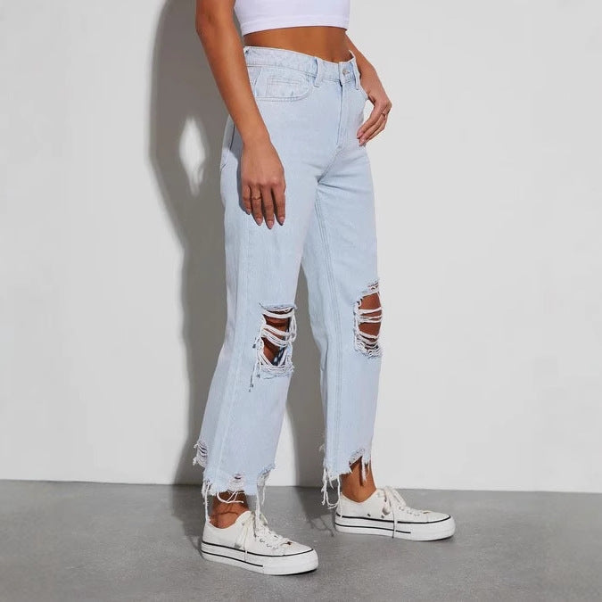 Dame Mom Jeans med frynset kant og ribbet detaljer Stilla