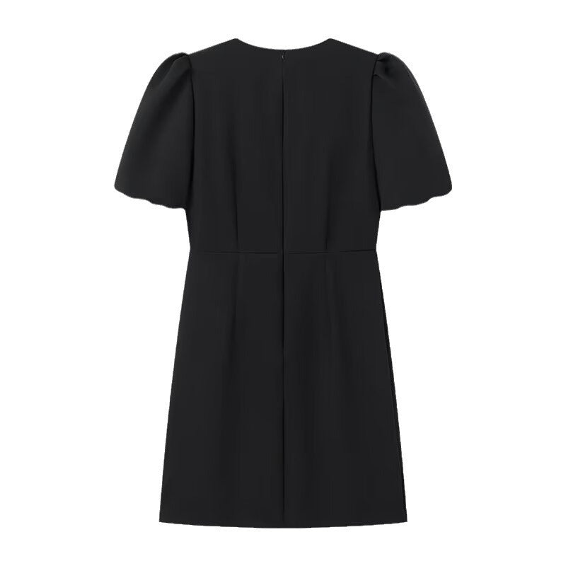 Damekjole med elegante puffærmer og dekorative sløjfer Stilla
