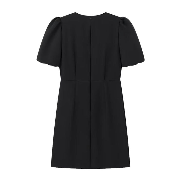 Damekjole med elegante puffærmer og dekorative sløjfer Stilla