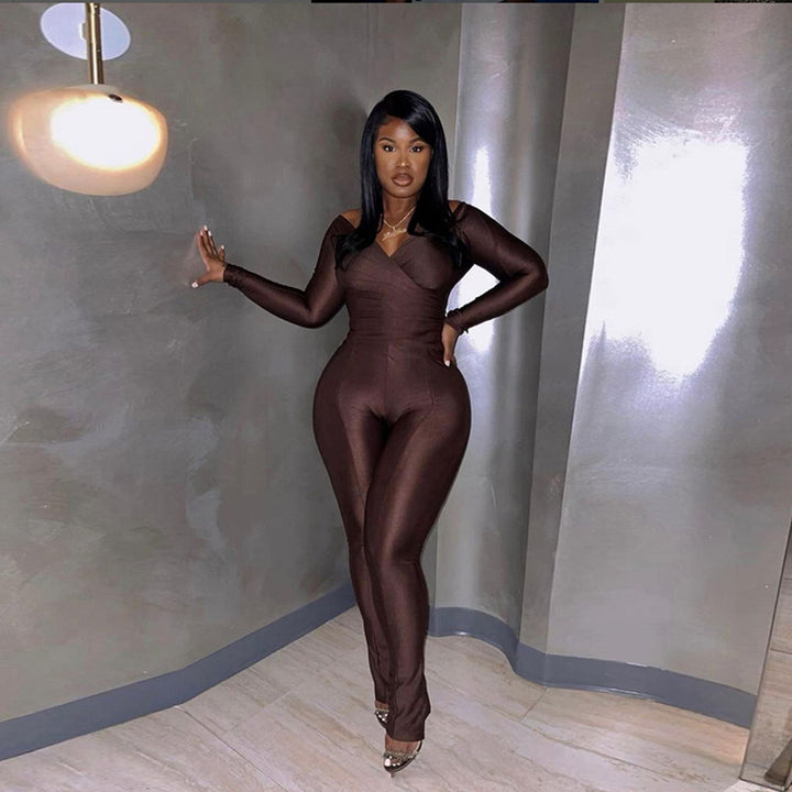 Dame Langærmet Jumpsuit med figursyet design og elegant indpakningsudskæring Stilla