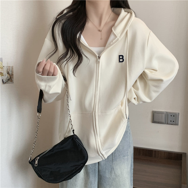 Femme Cozy Zip-Up Hættetrøje med funktionelle Kængurulommer Stilla