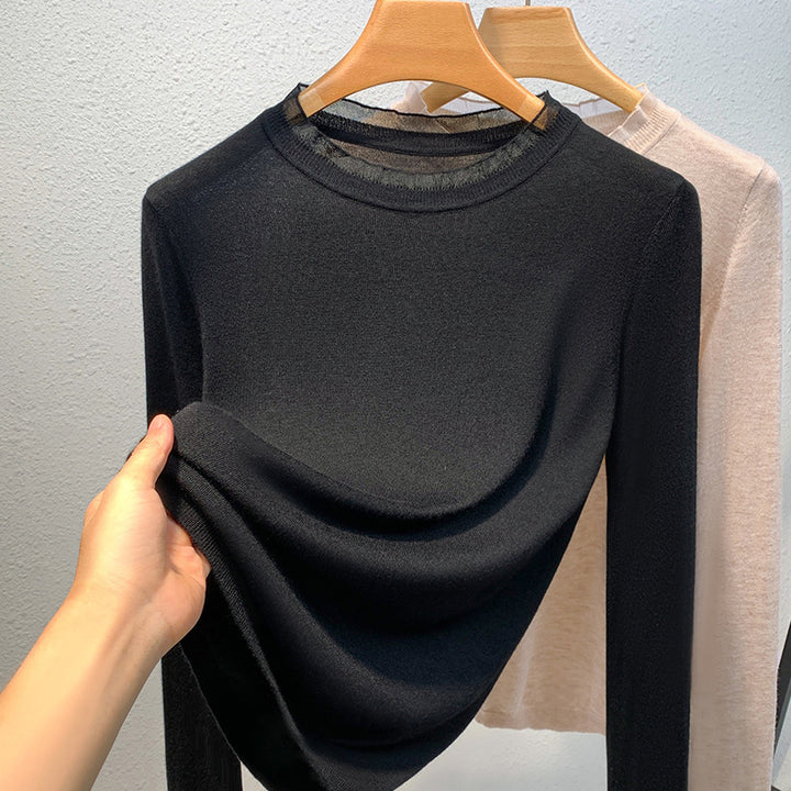 Dame finstrik bluse med elegant rund halsudskæring og blød tekstur Stilla