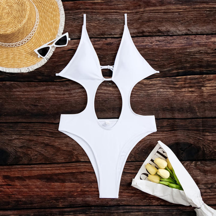 Dame one-piece badedragt med spændende cut-out-detaljer og dyb V-udskæring Stilla