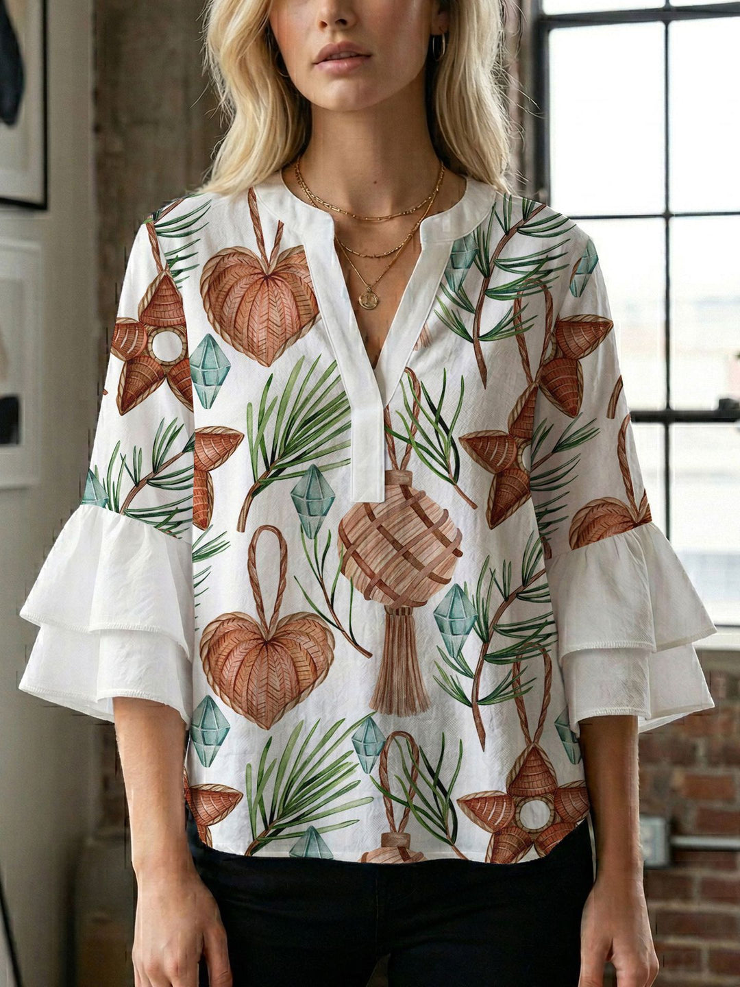 Dame bluse med voluminøse ærmer og kreativt trykdesign Skovae