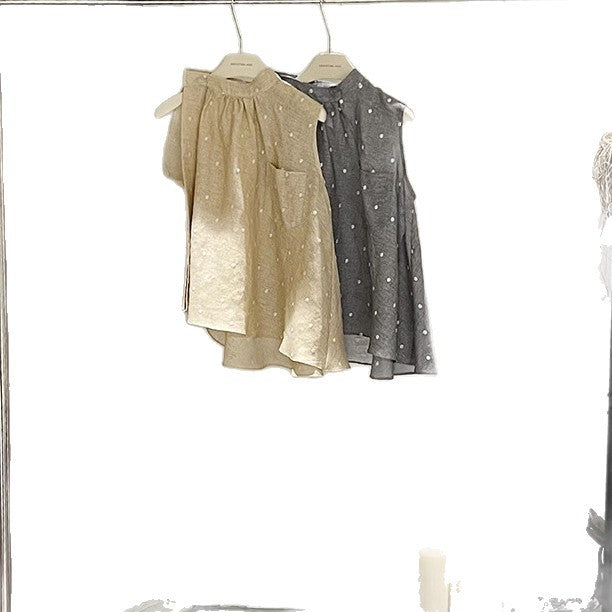 Dame asymmetrisk top med modern snit og fine detaljer Stilla