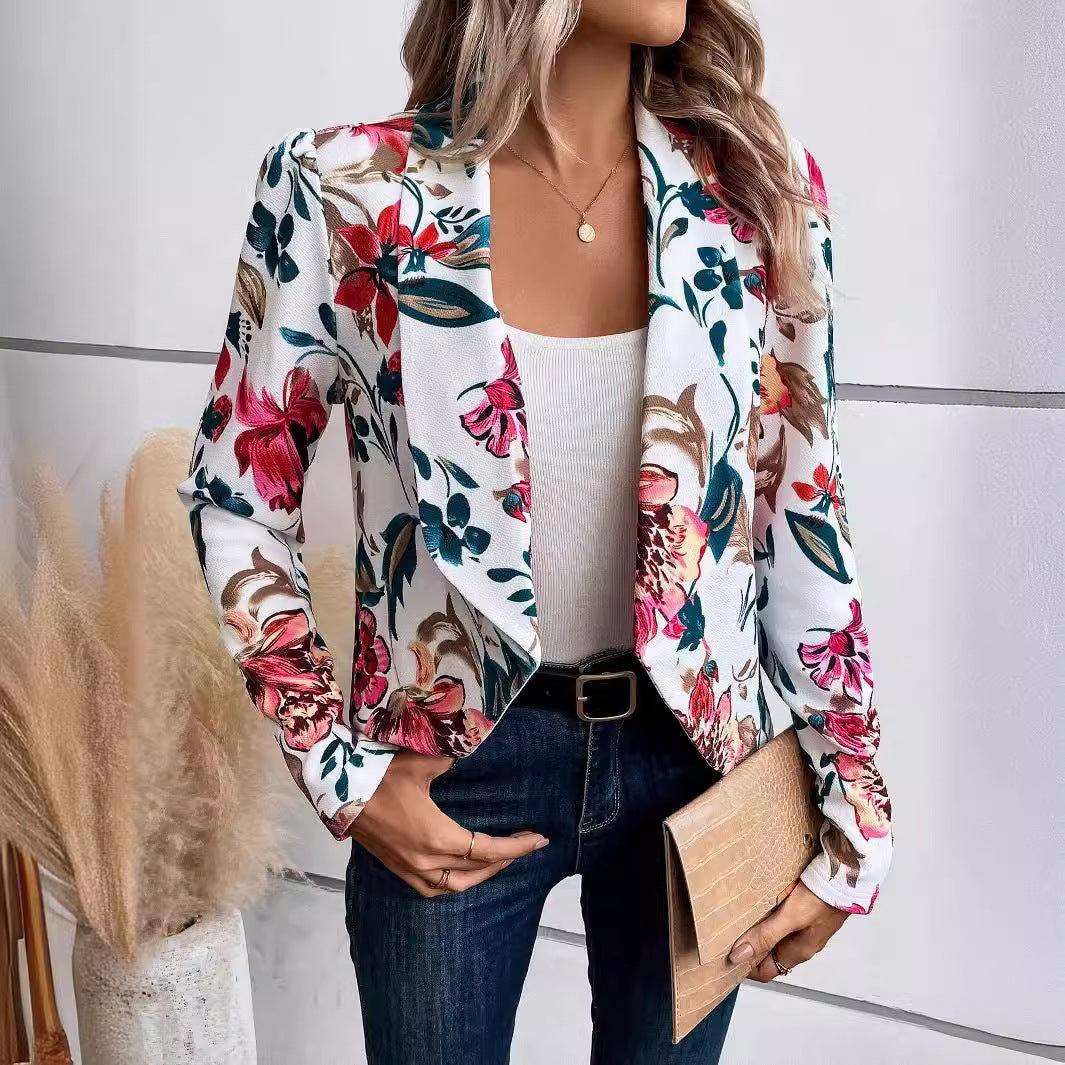 Dame blazer med blomster mønster og raffinerede puffærmer Stilla