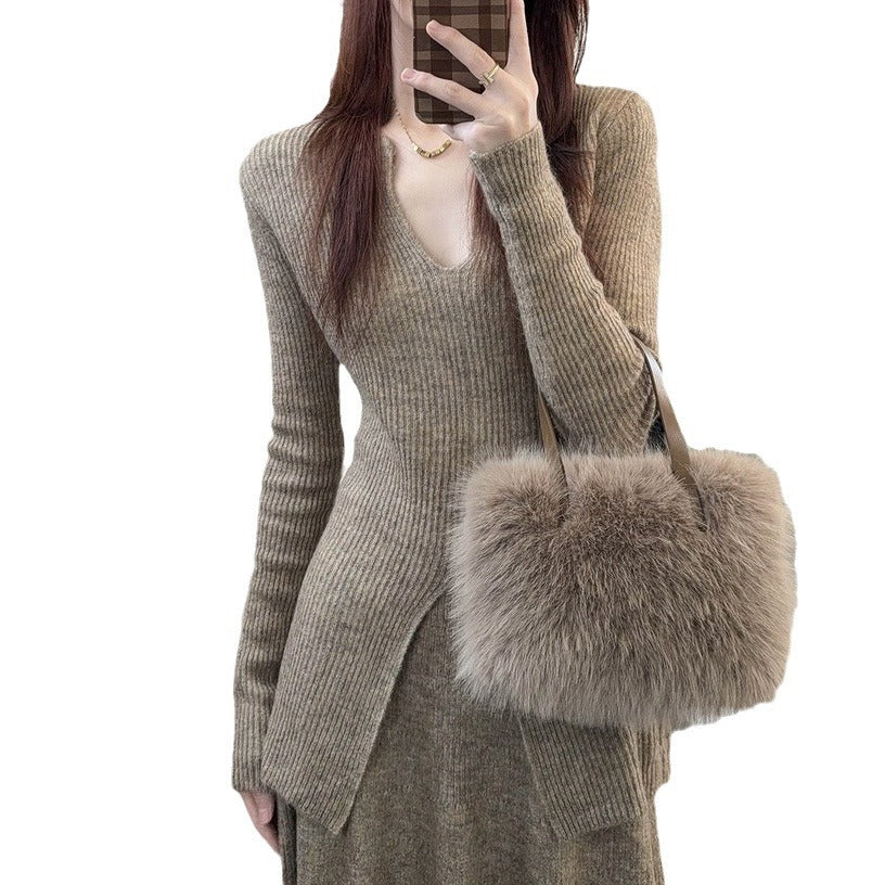 Kvindes ribbet sweater med dyb V-hals og afslappet pasform Stilla