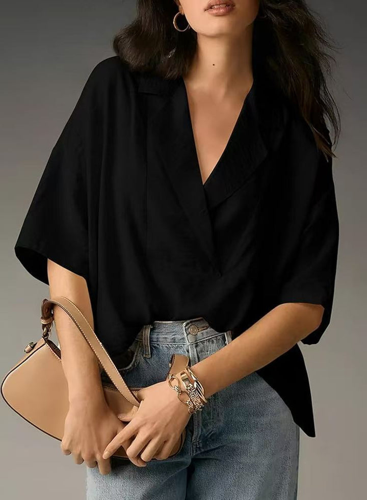 Dame Elegant og komfortabel bluse med V-udskæring og overskudte ærmer Stilla