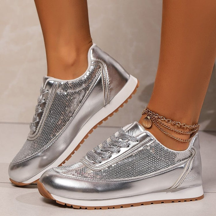 Dame sneakers med glitrende overflade og komfortabel dæmpning Stilla