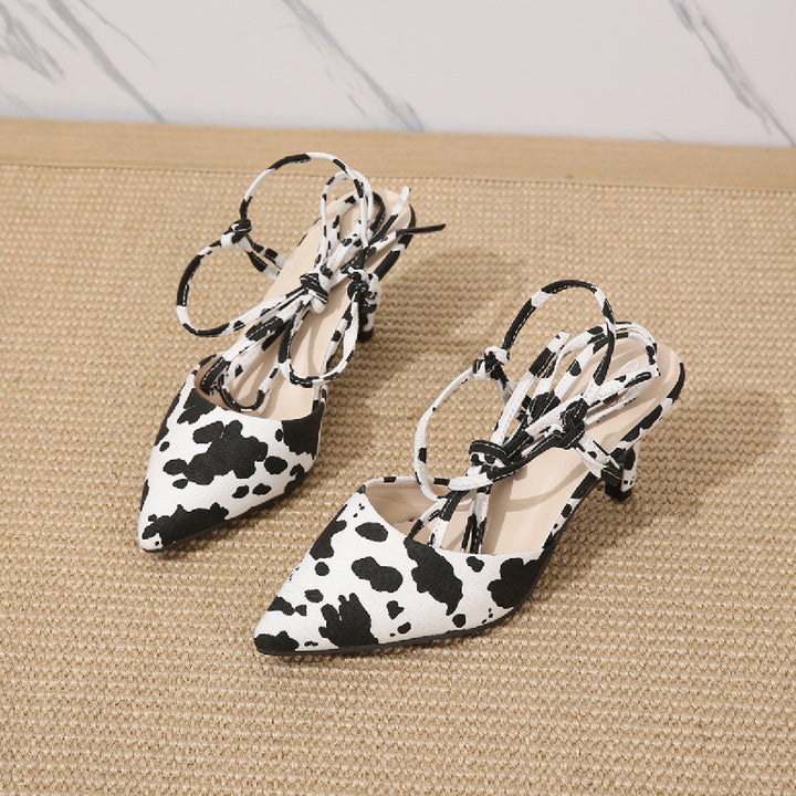 Dame Sling-Pumps med moderigtigt zebra-look og elegant rem-design Stilla