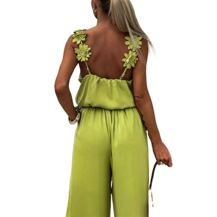 Dame jumpsuit med blomstrede flæser og brede ben Skovae