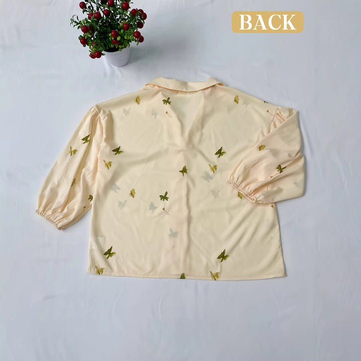 Damebluse med ruffle detaljer og blomsterbroderi design Skovae