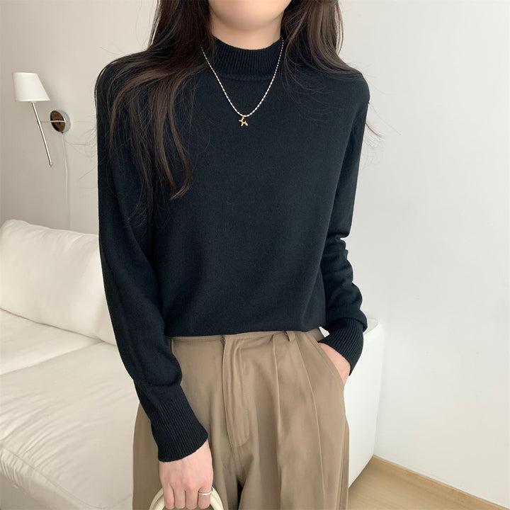 Dame finstrikket sweater med moderne ståkrave og afslappet pasform Stilla