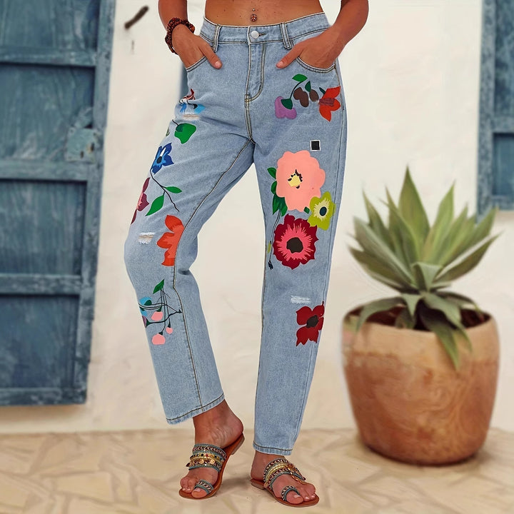 Damejeans med blomstret design og fashionable revnedetaljer Stilla