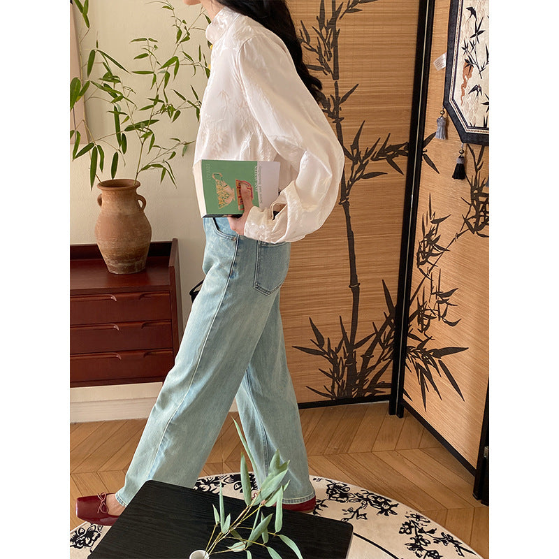 Damebluse med blomsterbroderi og fine knapdetaljer Stilla