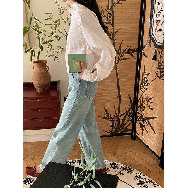 Damebluse med blomsterbroderi og fine knapdetaljer Stilla