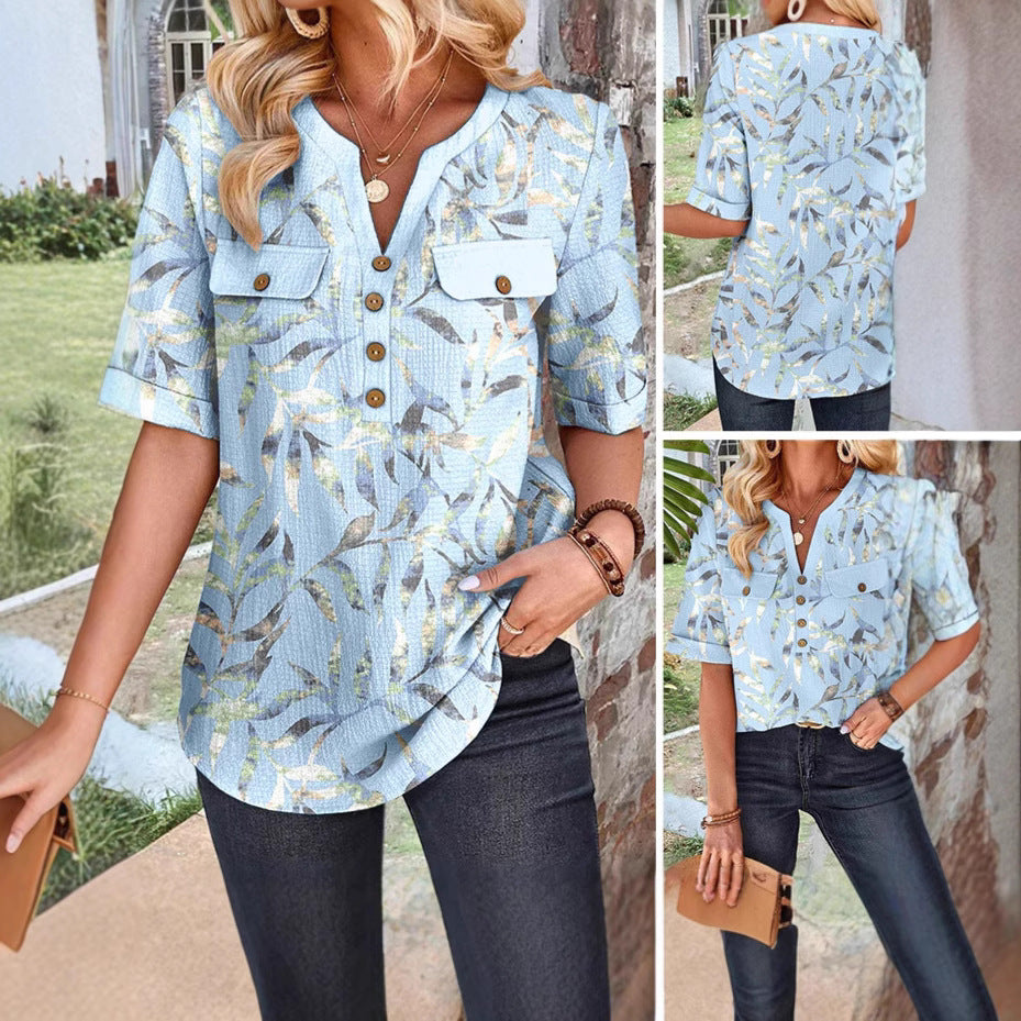 Damebluse med florale accenter og praktiske brystlommer Stilla