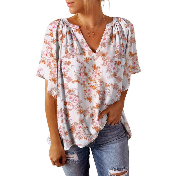 Damebluse med blomstermønster og V-hals Stilla