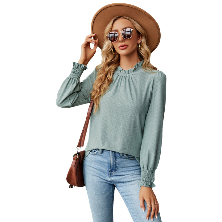 Dame volangbluse med elastiske ribkanter Stilla