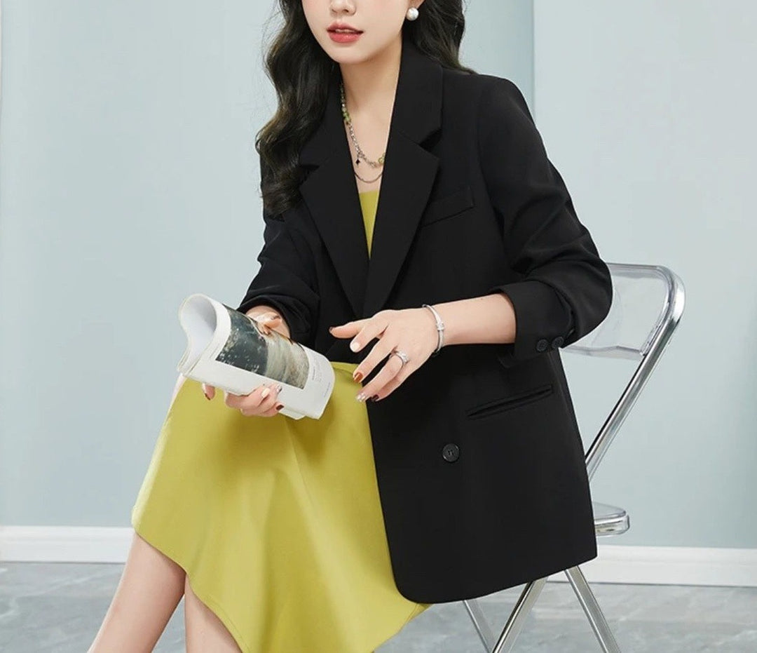 Kvinders stilfulde oversized blazer med dobbelt knapfane og stilfulde detaljer Stilla