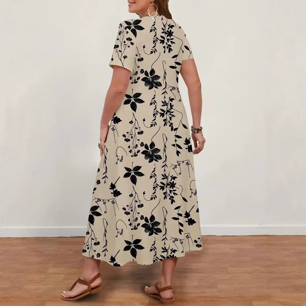 Dame maxikjole med blomsterdesign og dyb V-udskæring Stilla