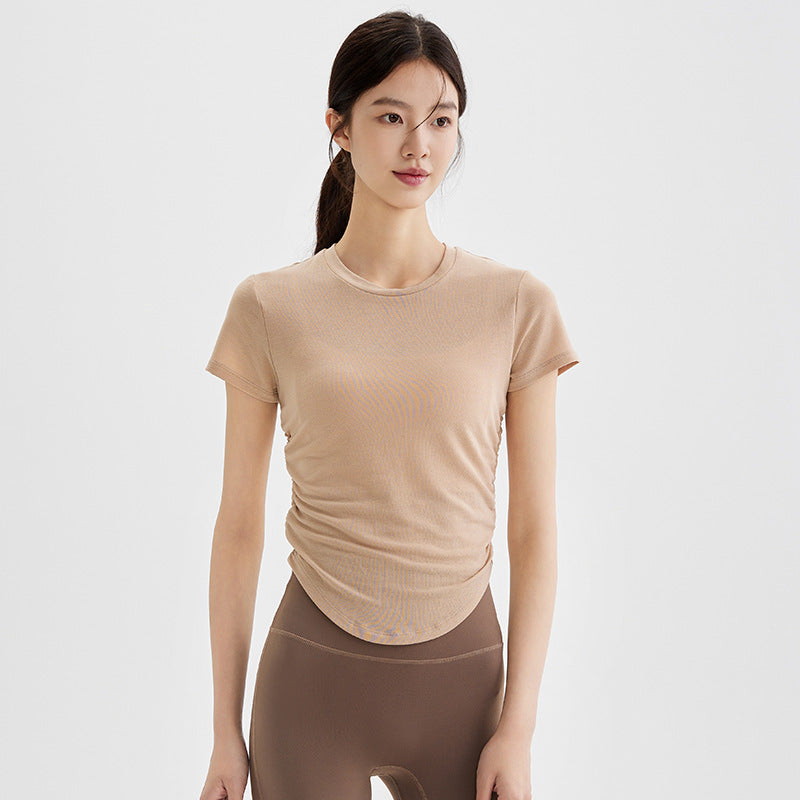 Dame sporty kortærmet top lavet af åndbart materiale med struktureret design Stilla