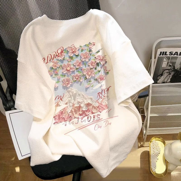 Dame T-shirt med kunstnerisk bjerg- og blomstermotiv Stilla