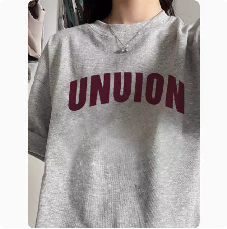 Dame Oversized T-shirt med grafisk tekst Stilla