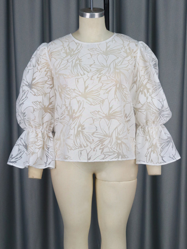 Damer Elegant Bluse med voluminøse ærmer og blomstermotiv Skovae