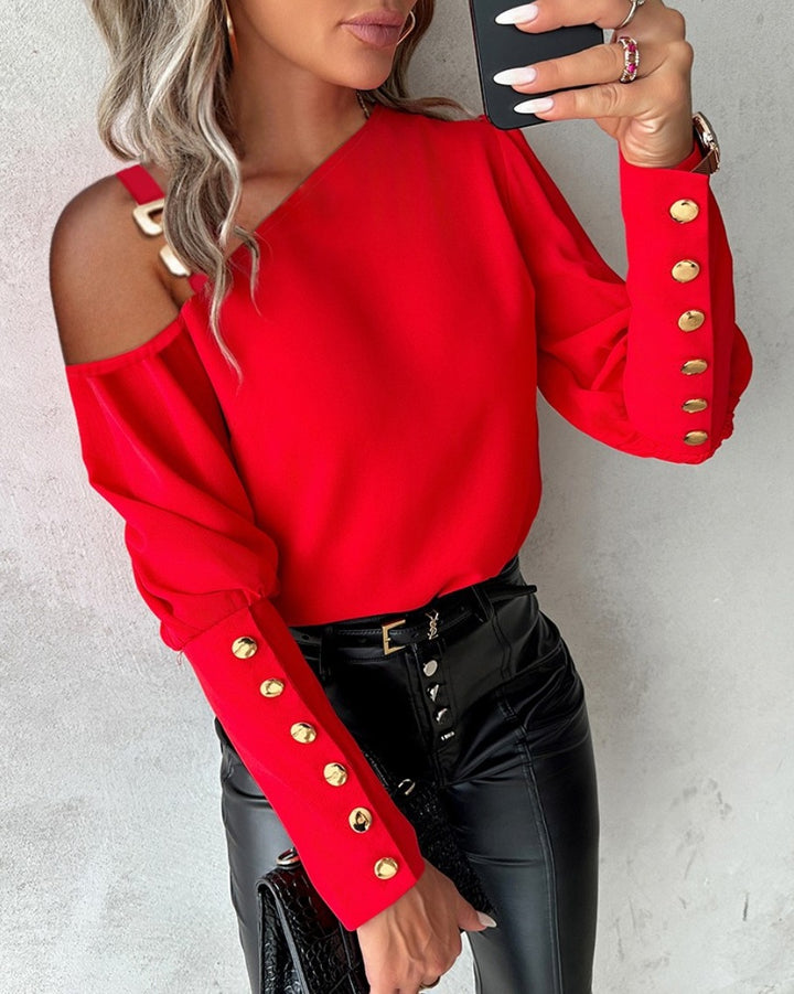 Dame Off-Shoulder Bluse med elegante knapdetaljer og voluminøse ærmer Stilla