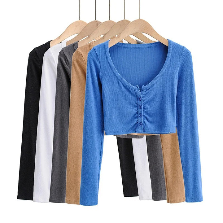 Dame cropped langærmet shirt med knapdetaljering og fin struktur Stilla