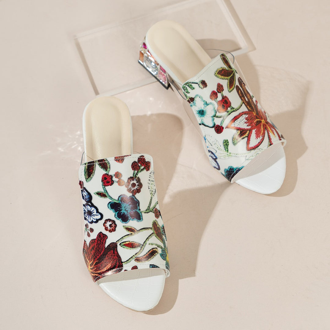 Dame Riemchen-Mules med blomsterdesign og komfortabel blokhæl Stilla