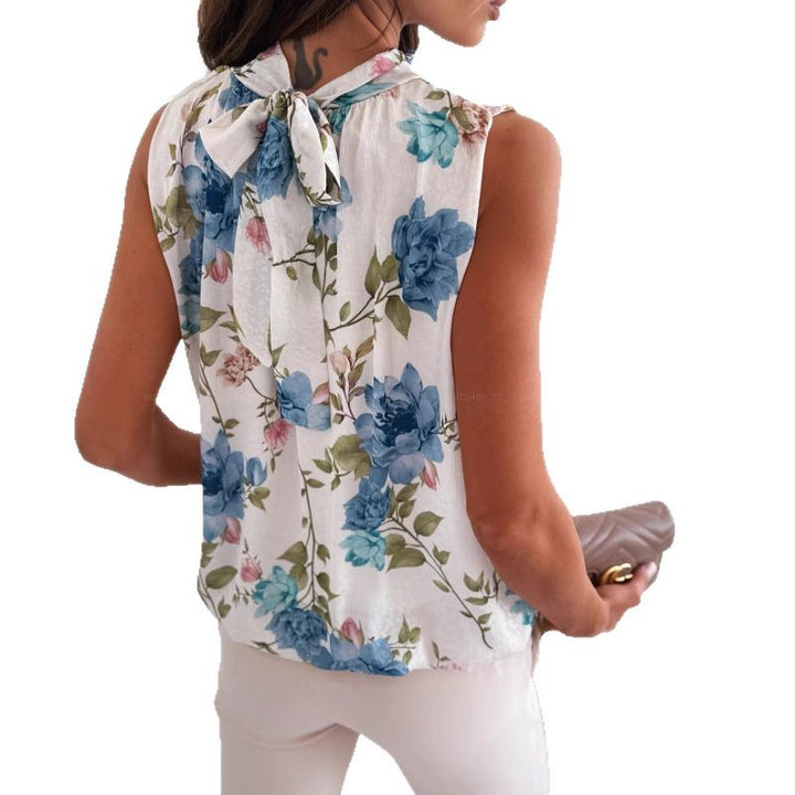 Damebluse med blomstertryk og høj udskæring Stilla