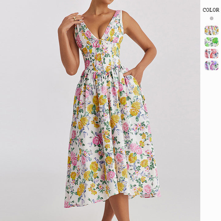 Dame midi kjole med blomstrede accenter og tætsiddende top