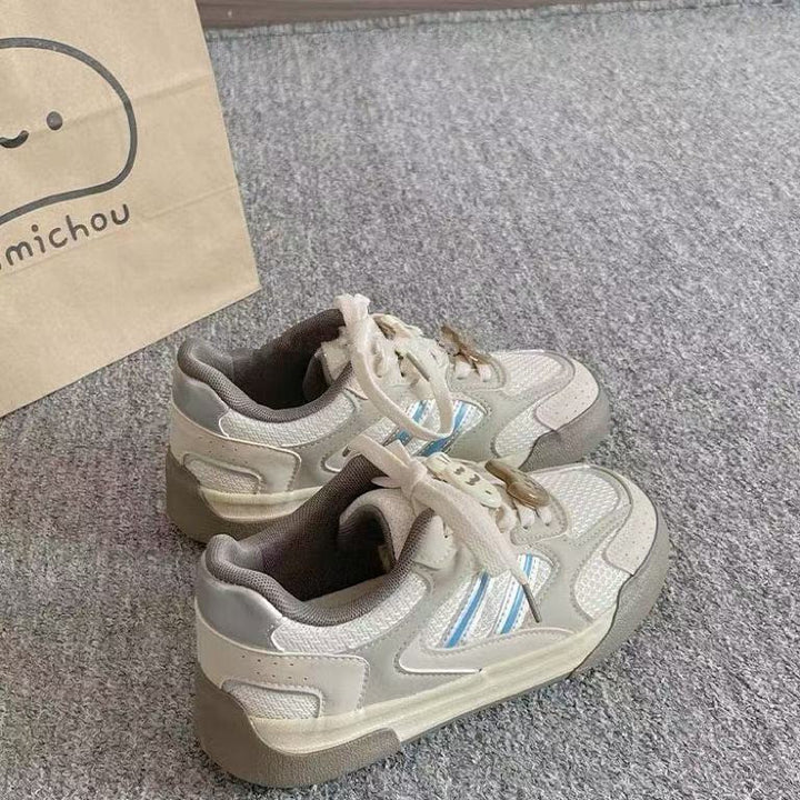 Dame sportlige sneakers med åndbart tekstiloverflade og unikke accenter Stilla