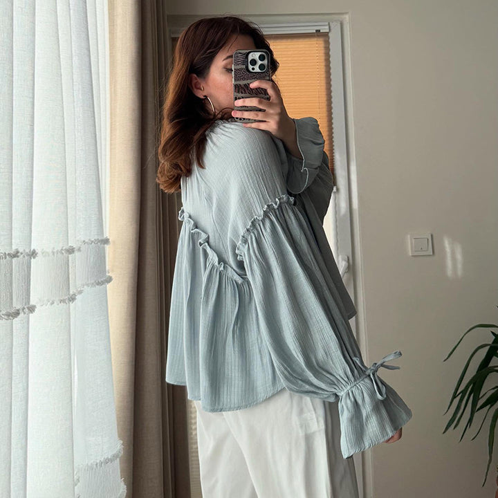 Dame ruskebluse med nostalgisk design og voluminøse ærmer Stilla