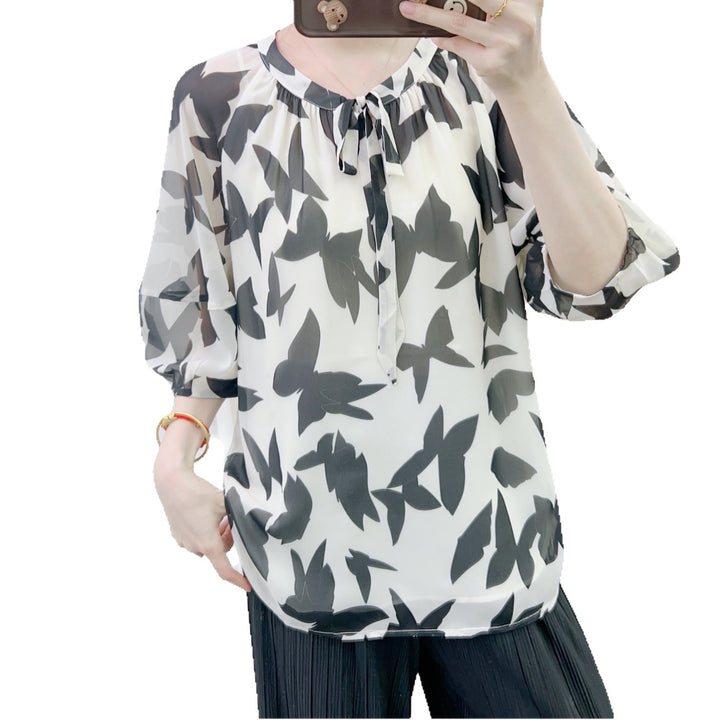 Dame chiffonbluse med elegant sløjfe krave og blomster mønster Stilla