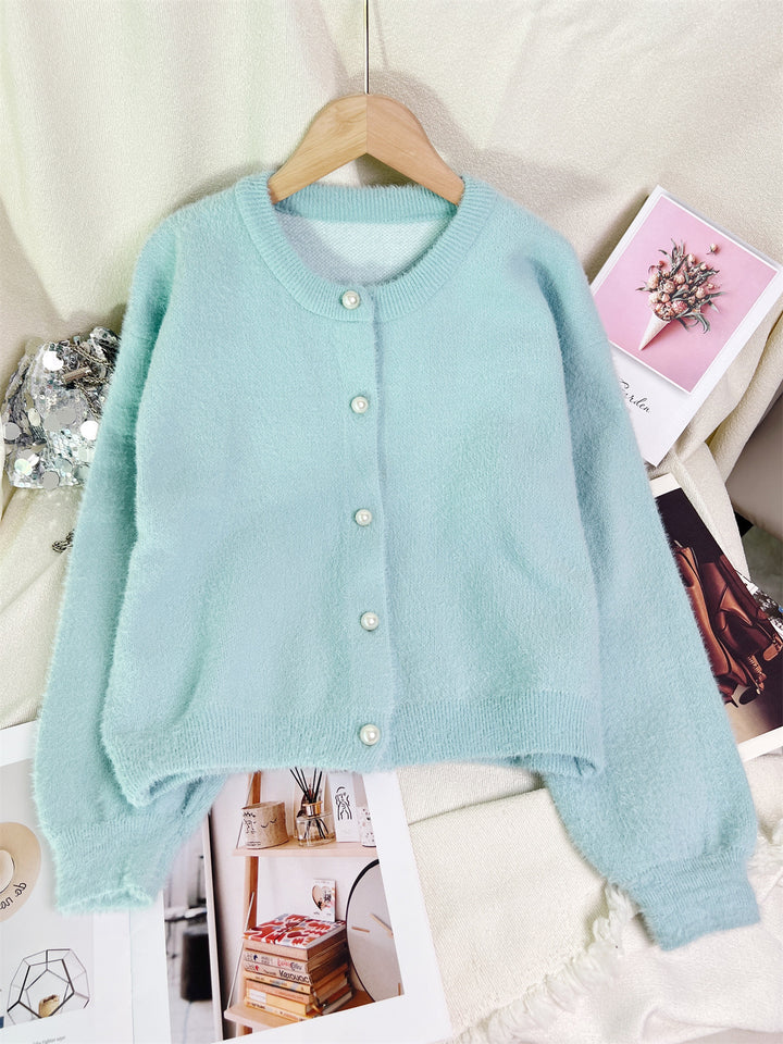Kvindernes hyggelige cardigan med perlebesatte knapper og moderne snit Stilla