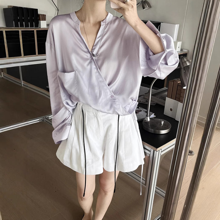 Damebluse med innovativt draperet design og fine detaljer Stilla