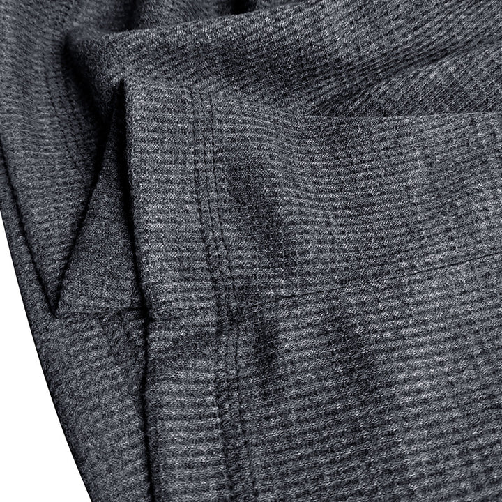 Herrer stilfuld langærmet Henley-shirt med struktureret design og elegant knaplukning Stilla