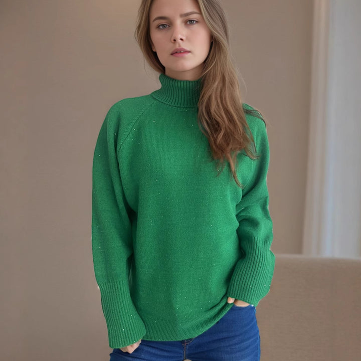 Damer elegant turtleneck sweater med struktureret strikdesign og glitrende accenter Stilla
