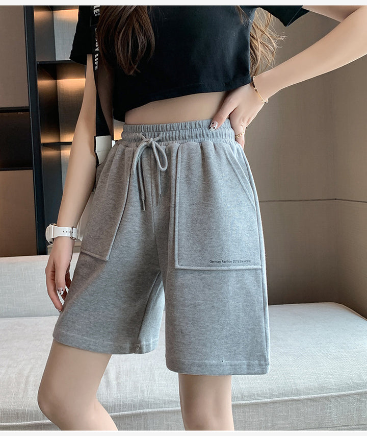 Femme Relaxed Fit Snorebånd Lounge Shorts med funktionelle lommer Stilla