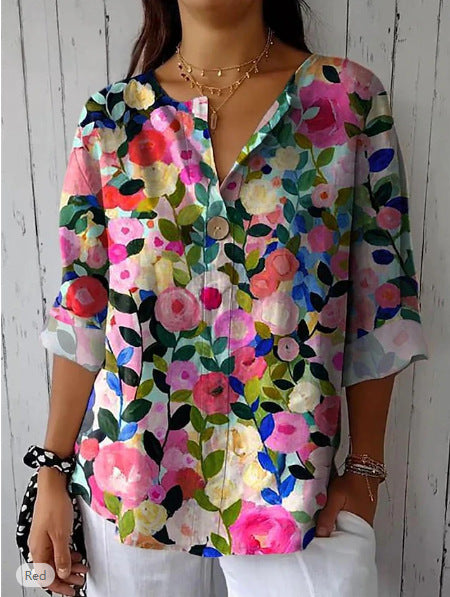 Damebluse med farverigt floralt mønster Stilla