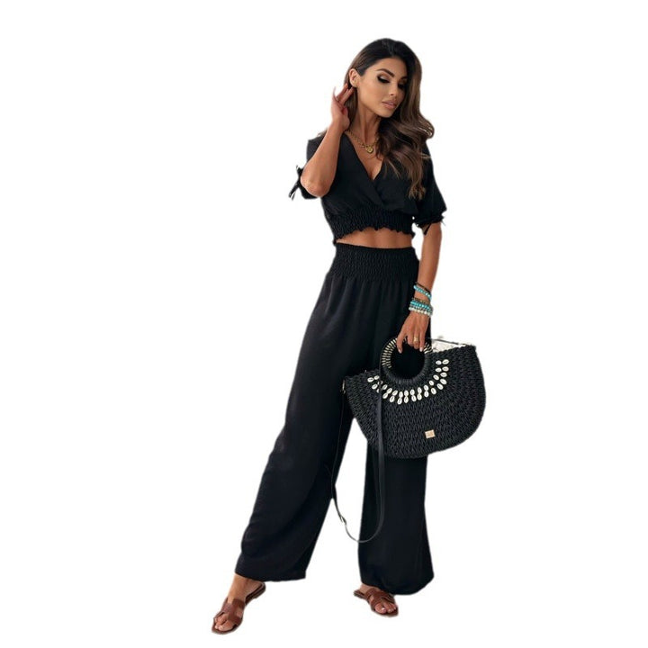 Dame afslappet to-delt buksedragt med elastisk talje og raffineret detalje Stilla