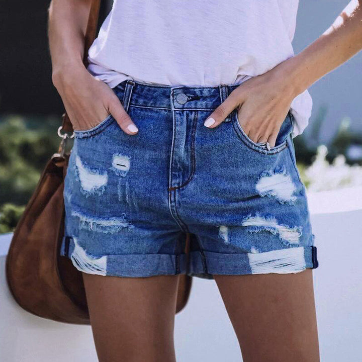 Dame mode denim-shorts med stilige riv detaljer og opfoldet kant Stilla