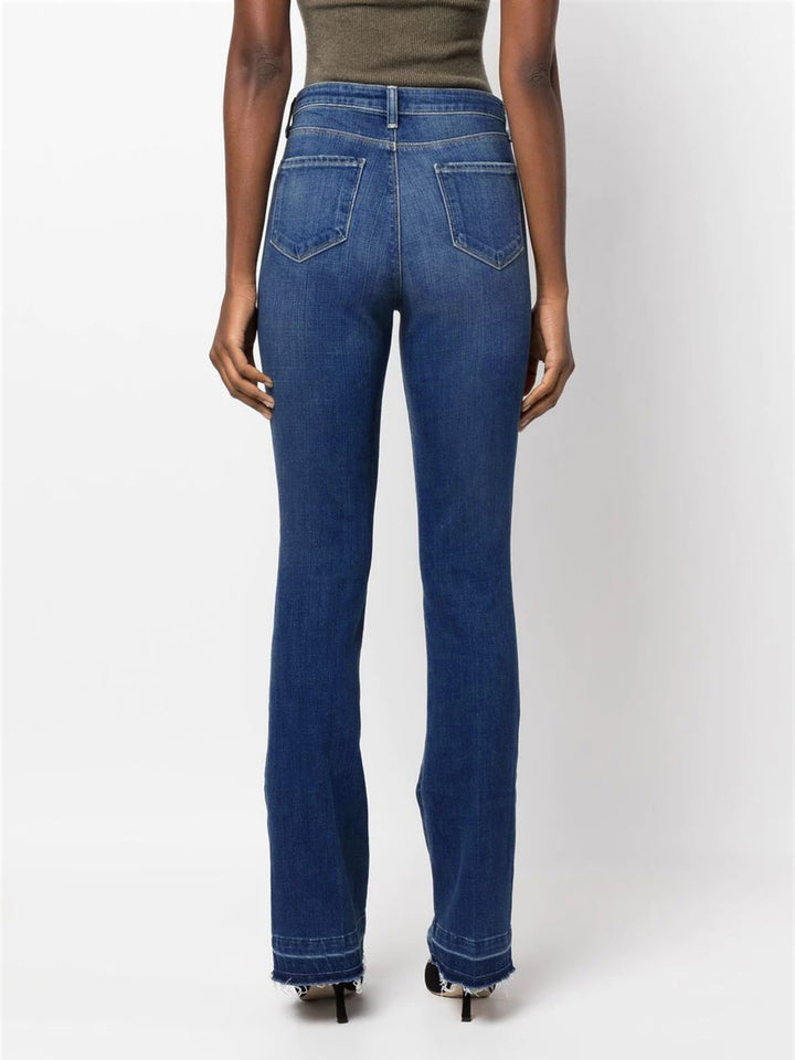 Dame Bootcut Jeans i afslappet design med frynset kant og høj talje Stilla