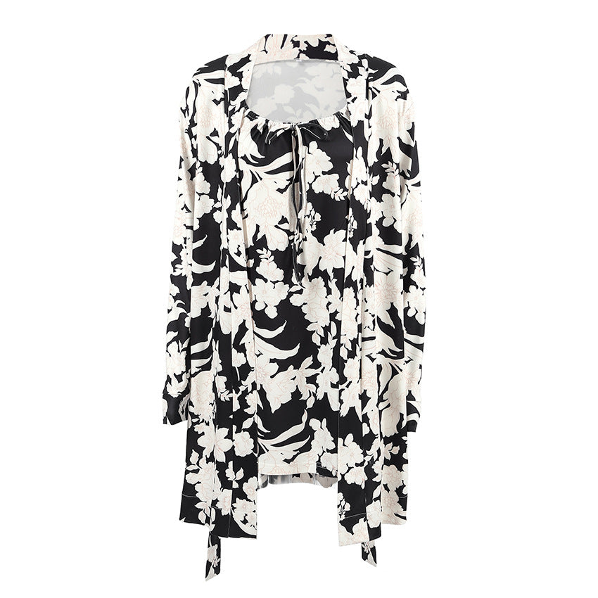 Dame elegant bluse- og kjolesæt med floralt mønster og detaljerede ærmeafslutninger Stilla