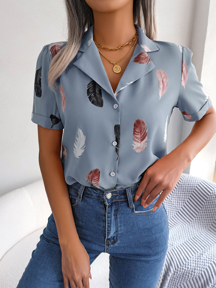 Damebluse med elegant fjerdesign Stilla